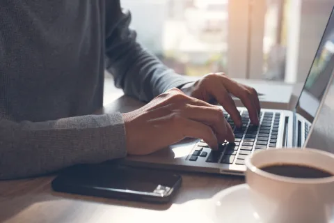 Person working on a laptop